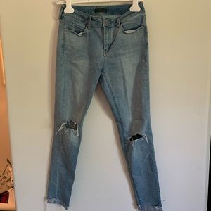 Light-wash ripped jeans